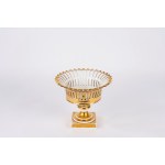 White and gold porcelain cake stand with an openwork design