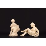 Two white ceramic sculptures