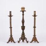 Three brass torch holders, 19th century