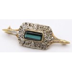 Jewelry - Yellow and white gold brooch with a tourmaline center stone...