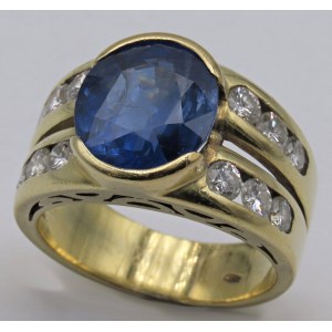 Jewelry - Yellow gold ring with 0.60 ct. diamonds and a sapphire...