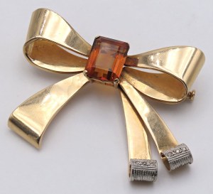 Jewellery - Spilla in oro giallo a forma di fiocco con al cent...