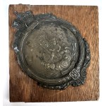 [CZĘSTOCHOWA] A plaque featuring an image of Our Lady of Częstochowa on a wooden base. A souvenir from Częstochowa. 1923.