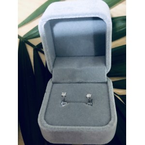 18-karat gold earrings with natural diamonds totaling 0.18 carats