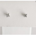 18-karat gold earrings with natural diamonds totaling 0.18 carats