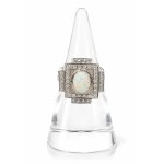 Ring with diamonds and an opal