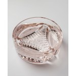 A bowl made of rose-patterned glass, with geometric decoration on the base, from the 1970s.