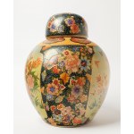 A ceramic, bulbous vase with a lid, known as the Elephant, most likely comes from Japan.
