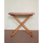 A fold-out side table with a movable tray. Manufactured by Askman, based on a design by Jorgen Miller, Denmark.