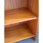 A teak-veneered bookcase. Made in Denmark. 1970s.