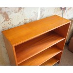 A teak-veneered bookcase. Made in Denmark. 1970s.