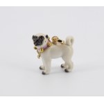 A dog-shaped pendant