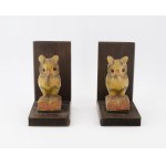 A pair of bookends with owl figurines