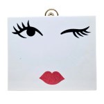 Fancy minaudière / evening clutch with a face design