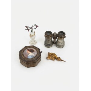 A collection of decorative items including a box with a miniature portrait, vintage binoculars, a porcelain vase, and a gilded fragment