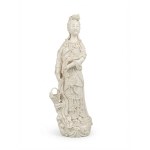 White porcelain figurine in the Blanc de Chine style depicting Guanyin with a basket, 23 cm.