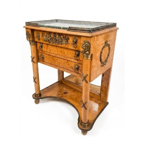 A Biedermeier-style chest of drawers with two drawers, veneered in fine burl wood, featuring natural partridge-eye grain.