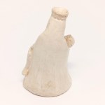 A plaster figurine of Michelangelo's *La Pietà*, signed