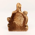 Handcrafted figurine of Michelangelo's *La Pietà* made from horn