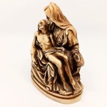 Handcrafted figurine of Michelangelo's *La Pietà* made from horn