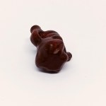 Handcrafted wooden figurine of the God of Fertility