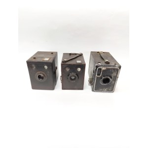 Three Kodak Brownie cameras—the Popular Brownie, the Six-20 Brownie Junior, and the Portrait Brownie