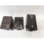 Three Kodak Brownie cameras—the Popular Brownie, the Six-20 Brownie Junior, and the Portrait Brownie