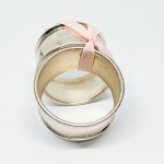 Two silver-plated napkin holders