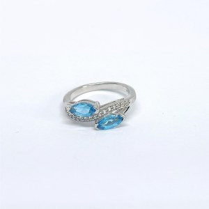 Silver ring with natural white and blue topaz stones