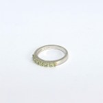 Silver ring with green sapphires (?)