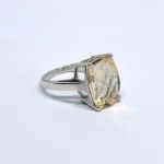 Silver ring with a large natural citrine