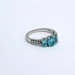 Silver ring with natural aquamarines and white sapphires
