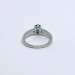 Silver Ring with a Natural Emerald and White Sapphires