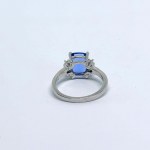 Silver ring with a natural London Blue topaz and white topazes