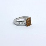 Silver ring with white quartz stones and an inclusion