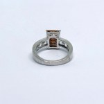 Silver ring with white quartz stones and an inclusion