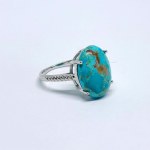 Silver ring with a large turquoise stone