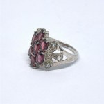 Silver ring with natural garnets and white sapphires