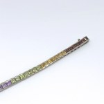 Silver bracelet with natural garnets, peridots, citrines, and amethysts