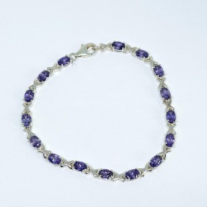 Silver bracelet with purple stones