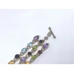Wide silver triple bracelet with amethysts, topazes, citrines, garnets, and peridots