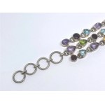 Wide silver triple bracelet with amethysts, topazes, citrines, garnets, and peridots