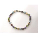 Silver bracelet with amethysts, peridots, citrines, topazes, and garnets