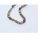Silver bracelet with amethysts, peridots, citrines, topazes, and garnets