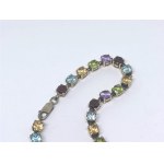 Silver bracelet with amethysts, peridots, citrines, topazes, and garnets