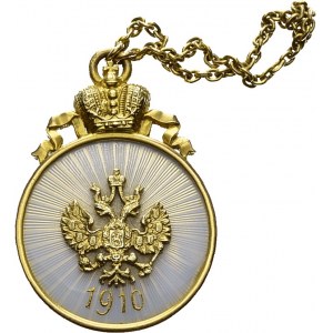 Gold medal (14 ct) ornated with white and red enamels...