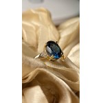 Unique 14-karat gold ring with a 1.39-carat London Blue topaz and diamonds - size 54