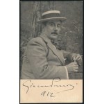 Giacomo Puccini (1858-1924) zeneszerző világhírű zeneszerző aláírása, dátumozással (1912) egy őt ábrázoló képeslapon, az egyik alsó sarkán törésnyommal, 14x8,5 cm / Autograph Signature of Giacomo Puccini (1858-1924) world famous Italian composer, with dat