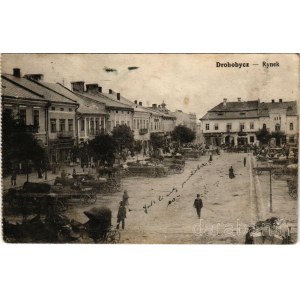 Drohobych, Drohobycz, Drohobics (Galicia, Galizien); Rynek / market square, shops. Leon Rosenschein (fl)
