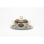 Two-handled porcelain soup tureen with a plate featuring blue and gold trim and leaf swirls. Limoges.